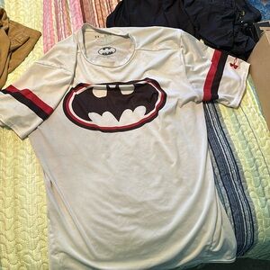 Gently used men’s athletic shirt. Has a pen mark on back. See picture